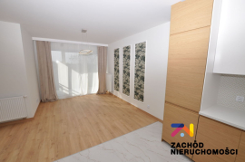 Atrakcyjna kawalerka z tarasem i balkonem